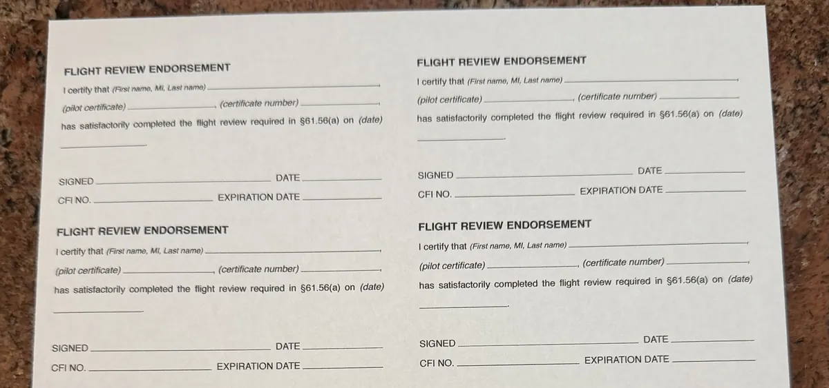 Flight review endorsement form showing the CFI certification language required by 14 CFR 61.56